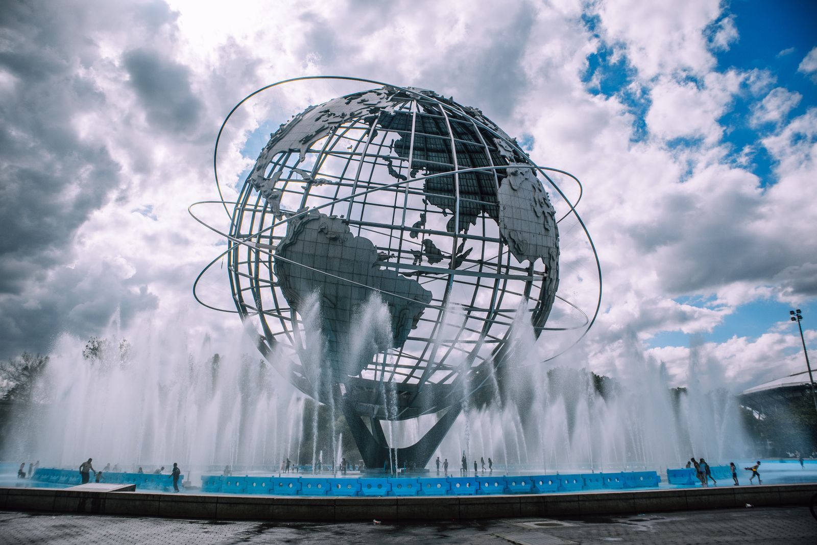 The steel Unisphere globe in Flushing Meadows Corona Park, Queens, with fountains spraying around its base